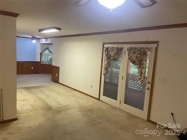 a kitchen with stainless steel appliances granite countertop a refrigerator and a stove