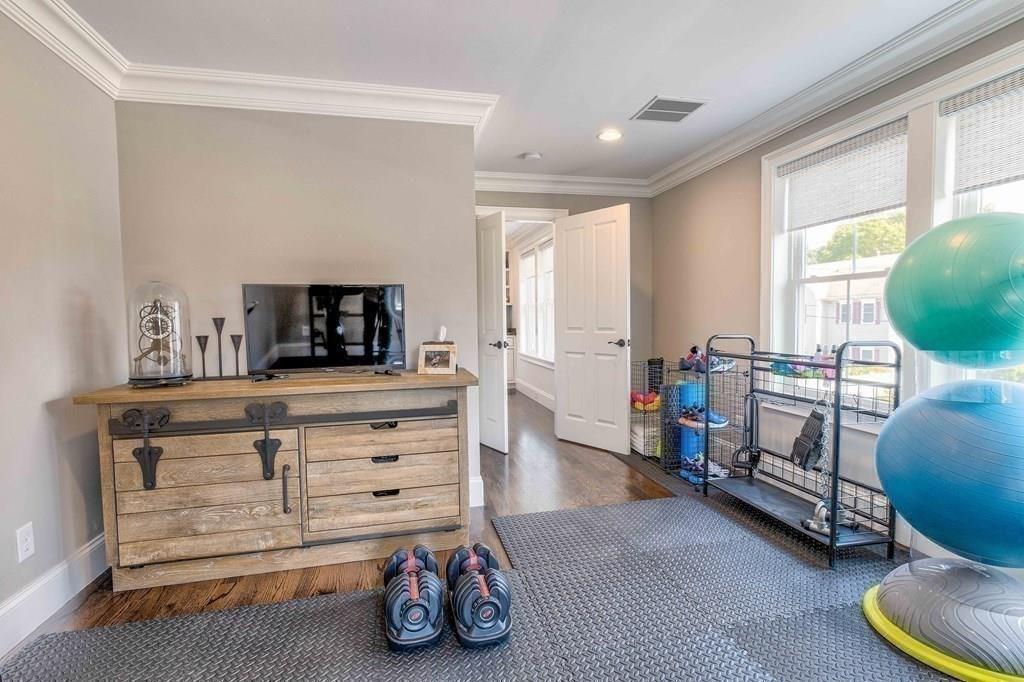 185 Cross Street Winchester, MA 01890 - Photo 24 of 41 a room with furniture and a window