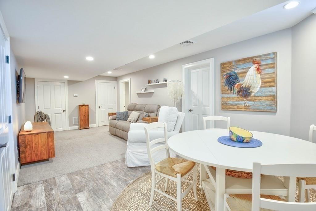 185 Cross Street Winchester, MA 01890 - Photo 34 of 41 a living room with furniture and a table