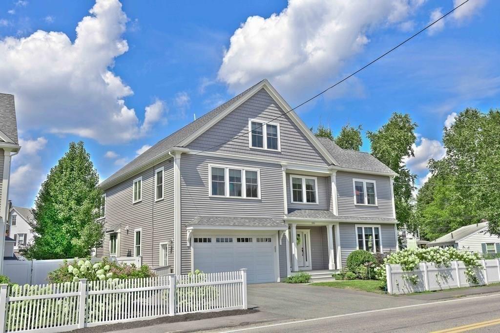 185 Cross Street Winchester, MA 01890 - Photo 38 of 41 a front view of a house with a yard