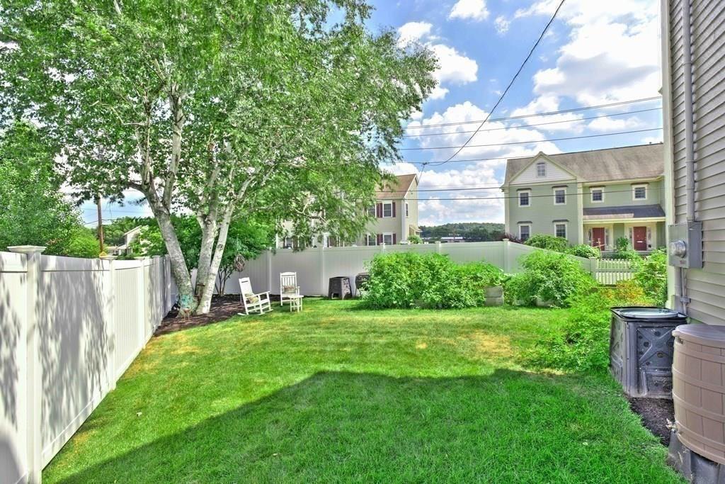 185 Cross Street Winchester, MA 01890 - Photo 40 of 41 a view of a house with a big yard and large trees