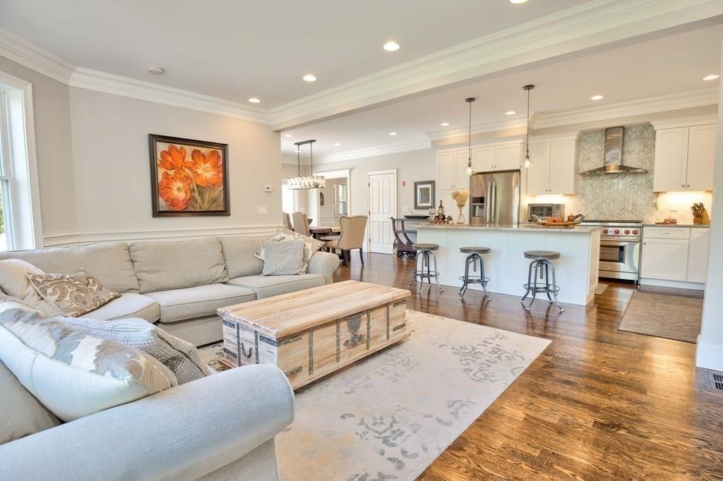 185 Cross Street Winchester, MA 01890 - Photo 8 of 41 a living room kitchen with furniture and a kitchen view