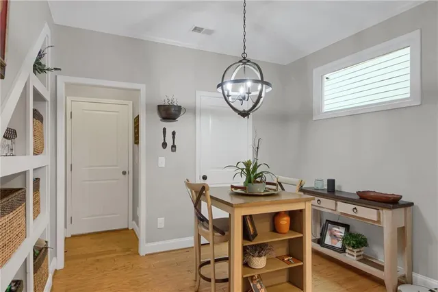 a view of dining room and wooden floor