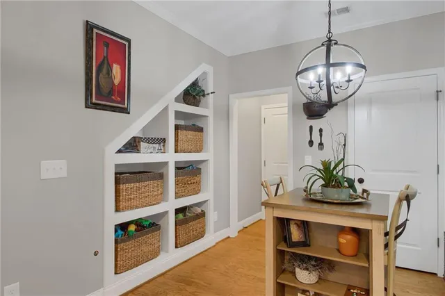 a view of a livingroom with furniture and a window