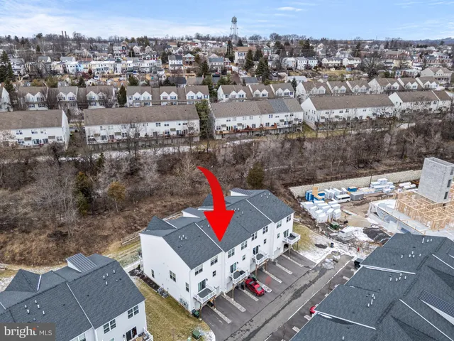 an aerial view of a city with streets