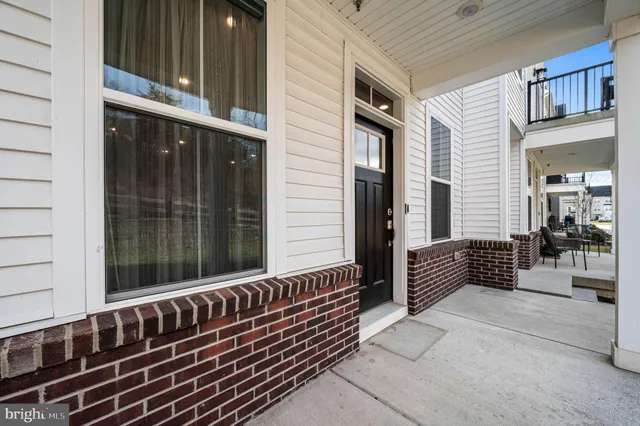 a view of a balcony with chairs
