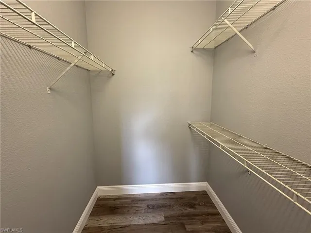 a view of a room with racks on the wall