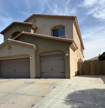 a view of a house with a garage
