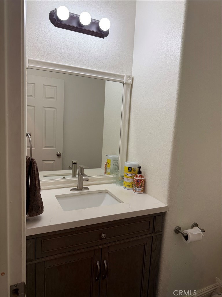 32044 Cypress Way Castaic, CA 91384 - Photo 10 of 59 a bathroom with a sink and a mirror