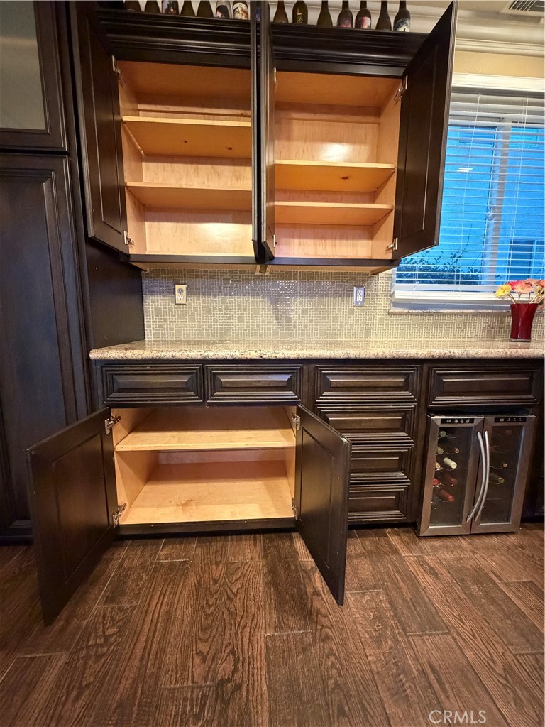 32044 Cypress Way Castaic, CA 91384 - Photo 22 of 59 a view of a kitchen with wooden floor and a sink