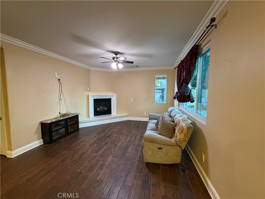 32044 Cypress Way Castaic, CA 91384 - Photo 26 of 59 a living room with furniture and a flat screen tv