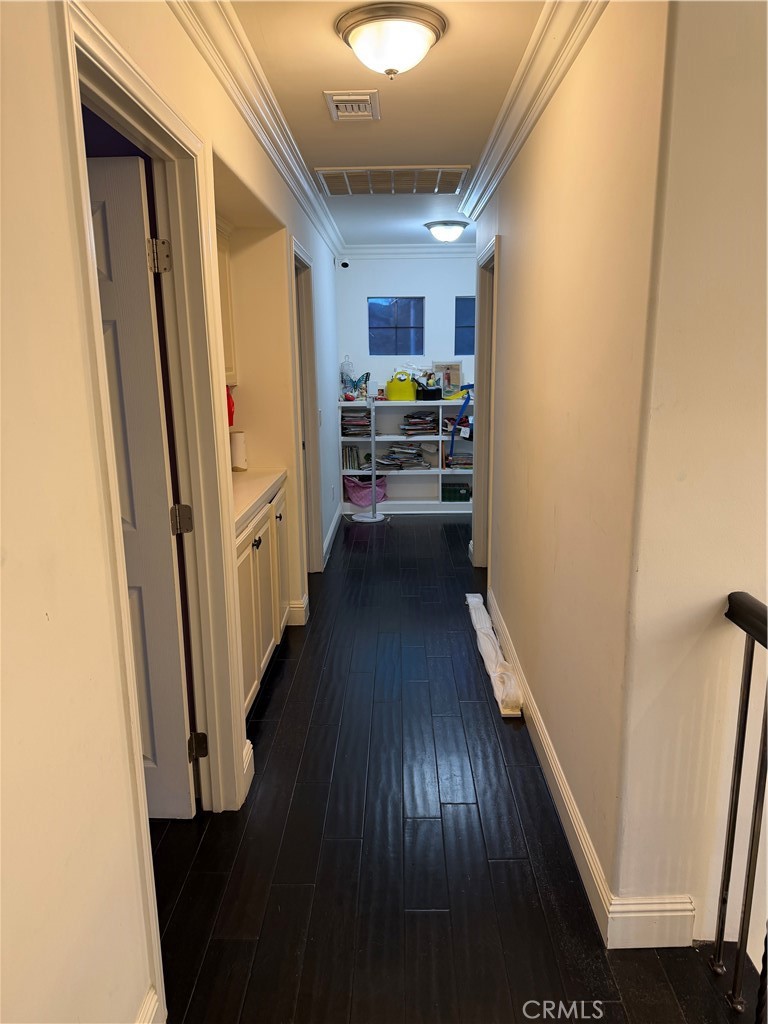 32044 Cypress Way Castaic, CA 91384 - Photo 31 of 59 a view of a hallway view with wooden floor and furniture