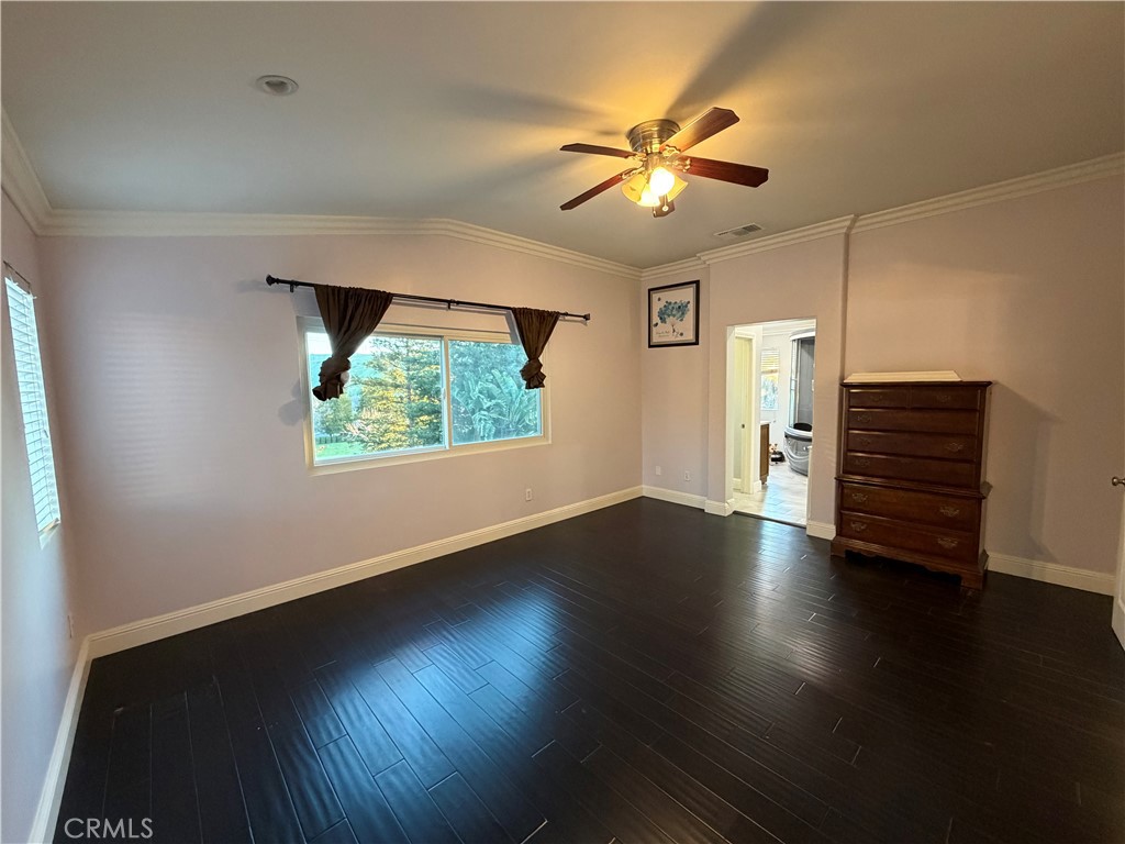 32044 Cypress Way Castaic, CA 91384 - Photo 33 of 59 a view of room with wooden floor and window