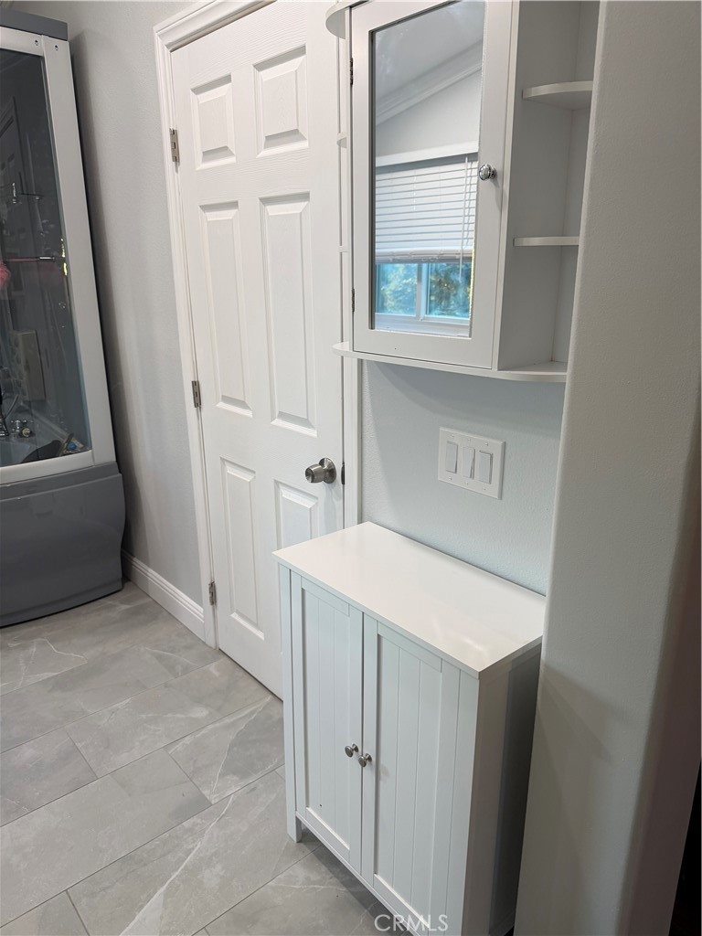 32044 Cypress Way Castaic, CA 91384 - Photo 37 of 59 a utility room with a window dryer and washer