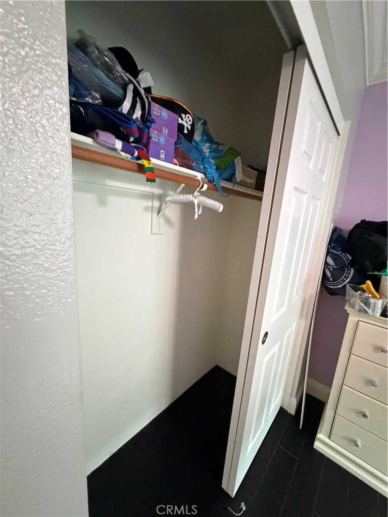 32044 Cypress Way Castaic, CA 91384 - Photo 45 of 59 a view of storage and utility room with wooden floor