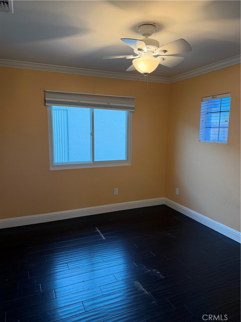 32044 Cypress Way Castaic, CA 91384 - Photo 49 of 59 a view of a room with wooden floor and a window