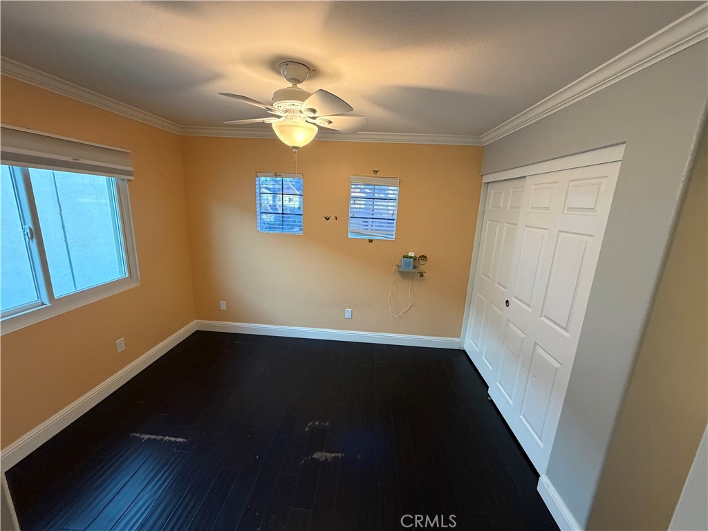 32044 Cypress Way Castaic, CA 91384 - Photo 50 of 59 a view of a hallway with wooden floor