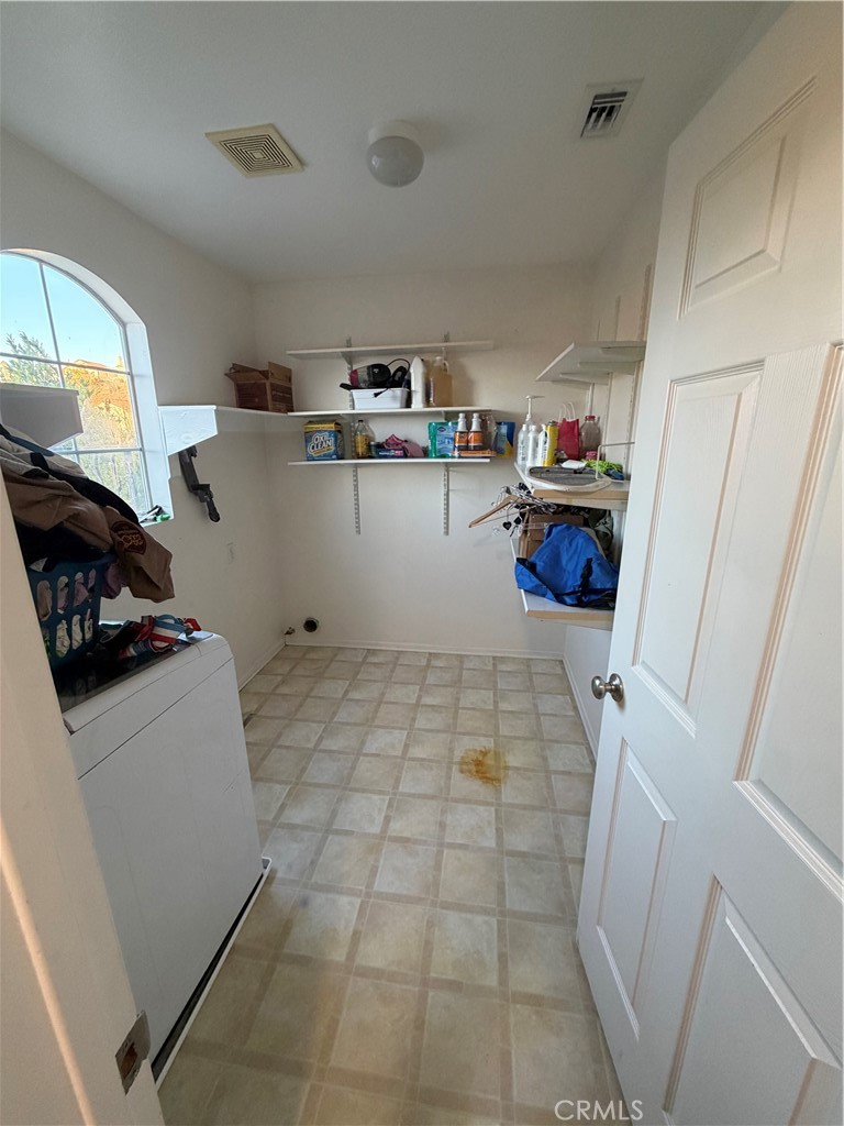 32044 Cypress Way Castaic, CA 91384 - Photo 56 of 59 a storage utility room with cabinets