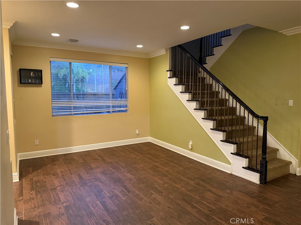 32044 Cypress Way Castaic, CA 91384 - Photo 5 of 59 a view of an entryway with wooden floor