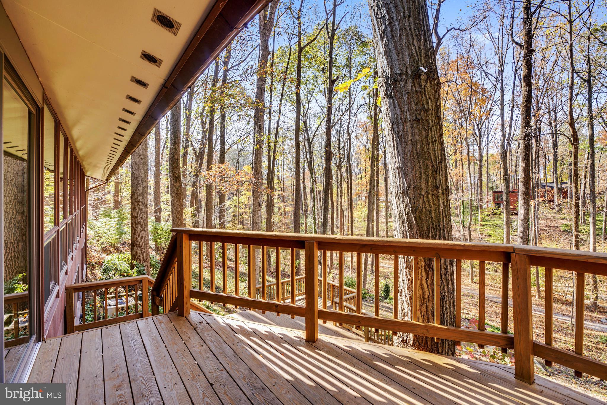 10993 Swansfield Road Columbia, MD 21044 - Photo 37 of 67 Walk out to the large bi-level deck