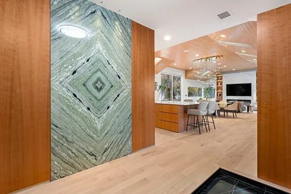 a view of a living room filled with furniture