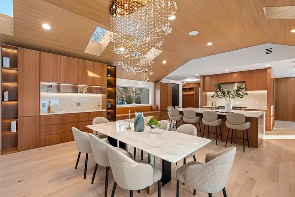 a view of a dining area with furniture and window