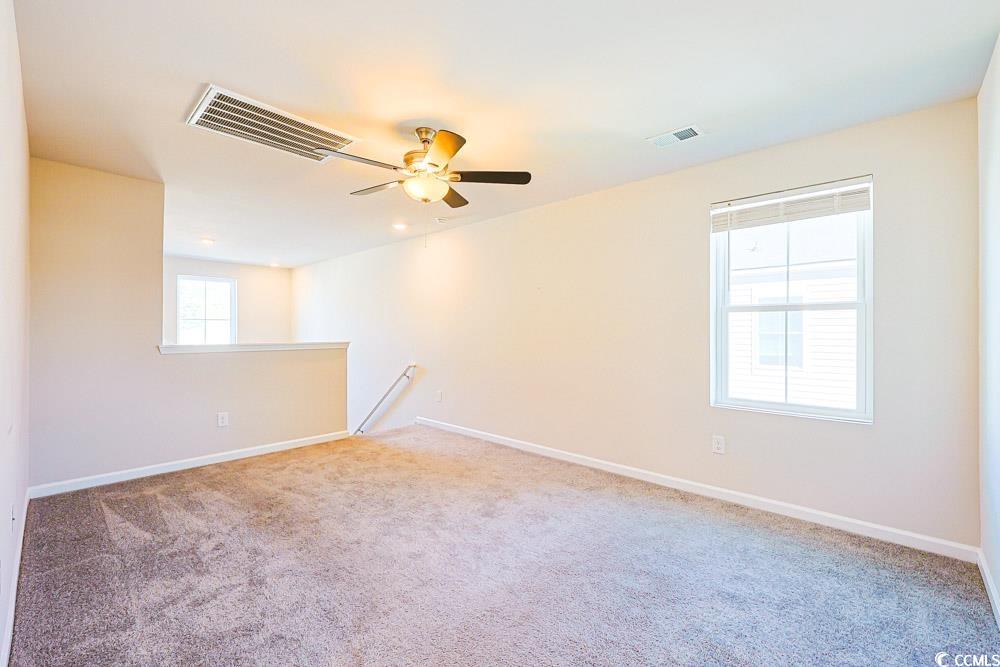 1560 Swing Bridge Way Myrtle Beach, SC 29588 - Photo 17 of 35 Unfurnished room featuring light colored carpet and ceiling fan