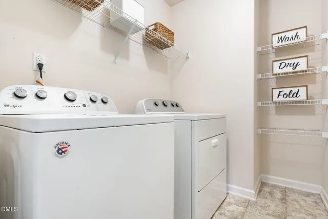 a view of a house with backyard porch and sitting area