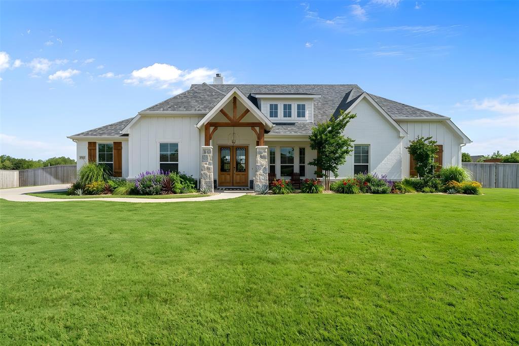 8221 David Lane Midlothian, TX 76065 - Photo 1 of 34 a front view of house with yard and green space