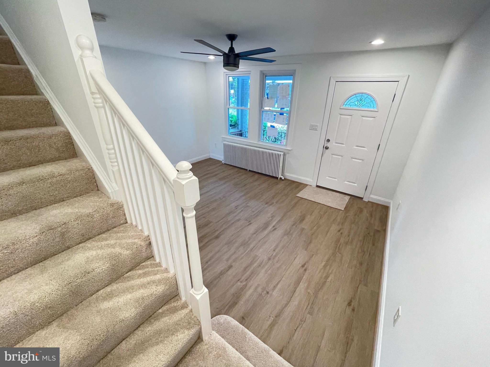 1718 Lang Place Northeast Washington, DC 20002 - Photo 11 of 32 a view of an entryway with wooden floor