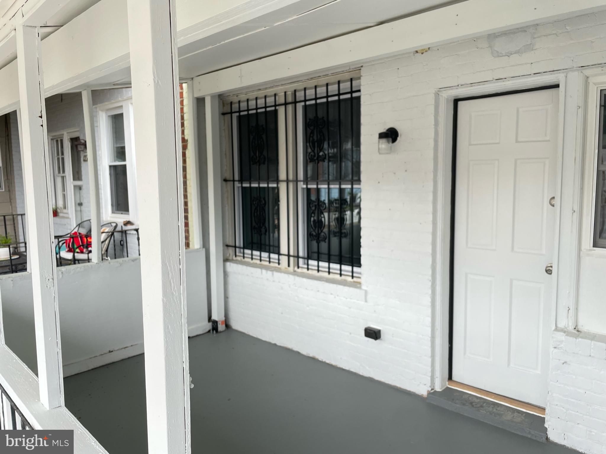 1718 Lang Place Northeast Washington, DC 20002 - Photo 28 of 32 front view of a house with a white door