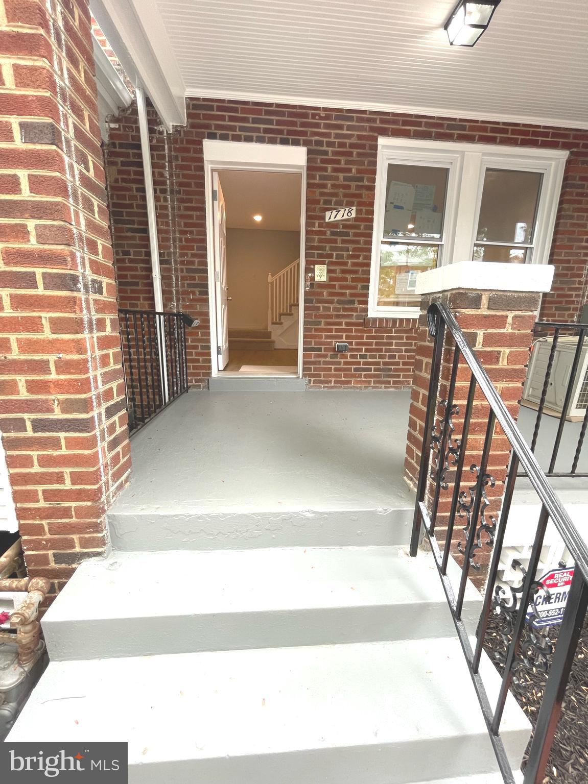 1718 Lang Place Northeast Washington, DC 20002 - Photo 3 of 32 a view of entryway with a front door