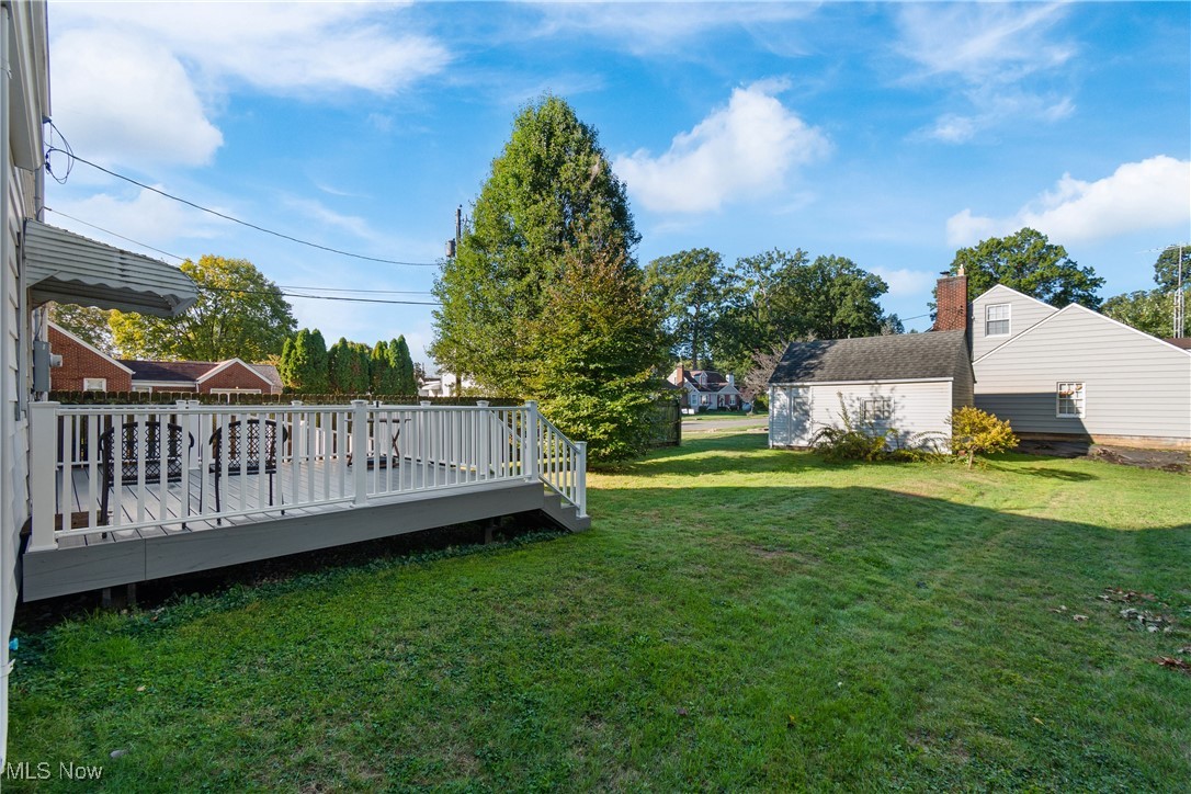 955 Raff Road Southwest Canton, OH 44710 - Photo 25 of 33 View of green lawn with a deck