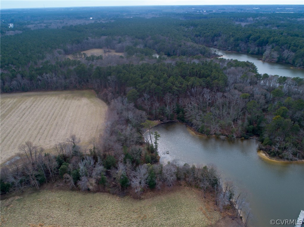 0 Vir-Mar Beach Road Heathsville, VA 22473 - Photo 14 of 21 a view of a yard next to a lake
