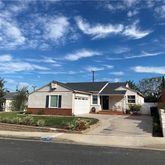 front view of a house with a street