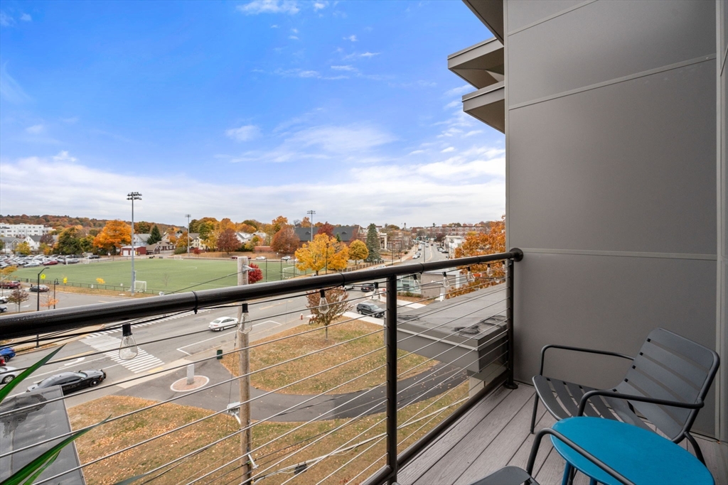 3 Bennett Street, Unit 402 Wakefield, MA 01880 - Photo 12 of 23 a view of balcony with furniture