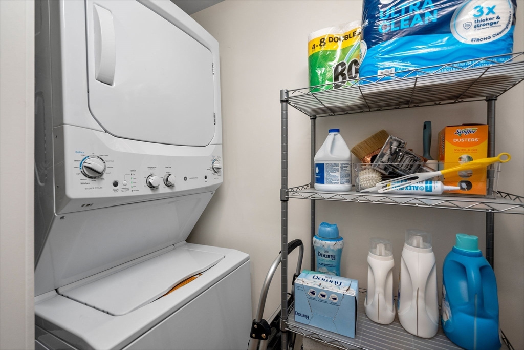 3 Bennett Street, Unit 402 Wakefield, MA 01880 - Photo 19 of 23 a utility room with dryer and washer