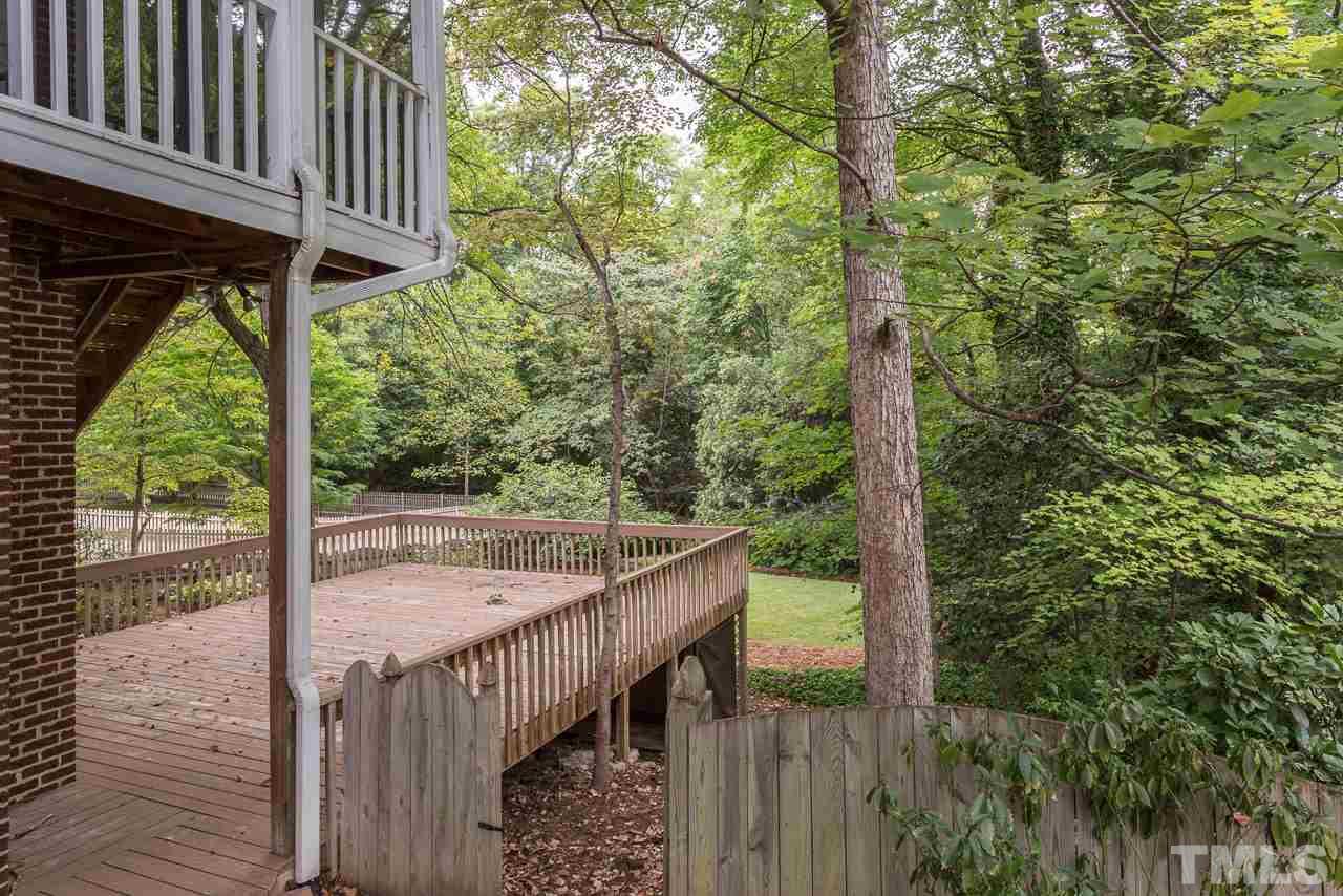 2276 The Circle Raleigh, NC 27608 - Photo 20 of 25 a view of a balcony with wooden floor