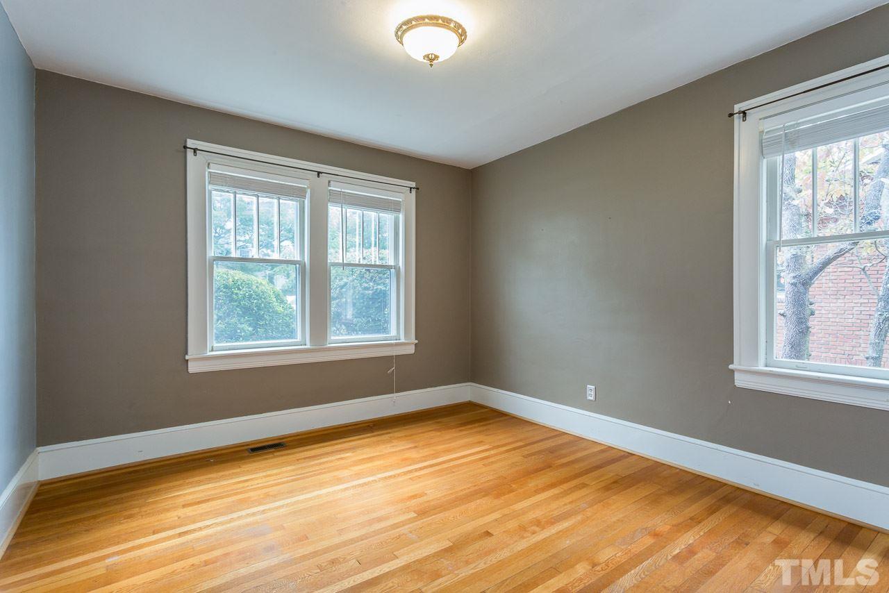 2276 The Circle Raleigh, NC 27608 - Photo 7 of 25 a view of an empty room with a window
