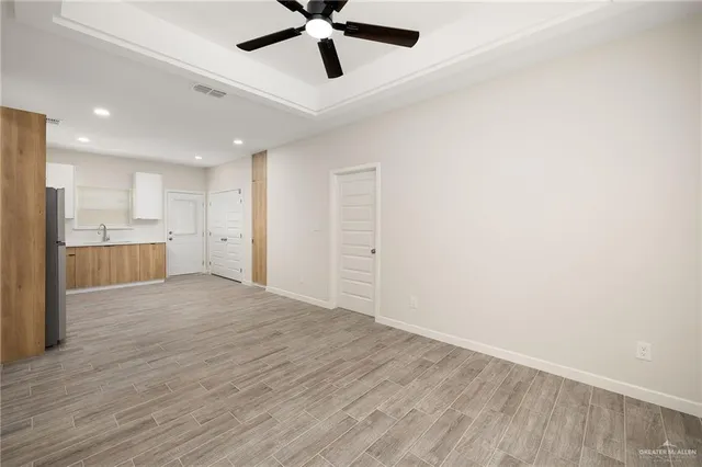 a kitchen with a refrigerator stove and microwave