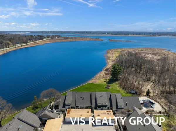 $450,000 | 570 Wind Drift Lane, Unit 25, Spring Lake, MI 49456