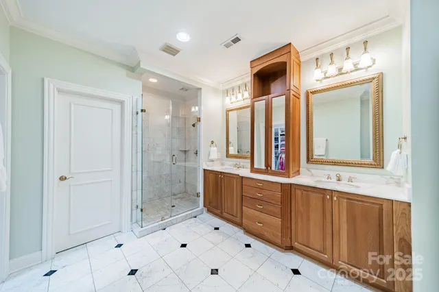 a bathroom with a bathtub shower and a sink