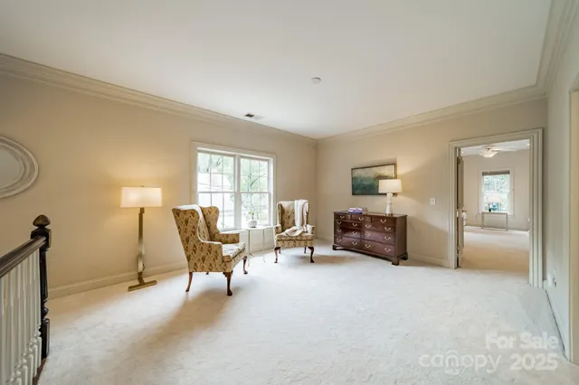 a view of a house with backyard sitting area and garden