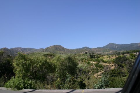 438 Conejo Road Santa Barbara, CA 93103 - Photo 1 of 13 a view of a mountain range with lush green forest