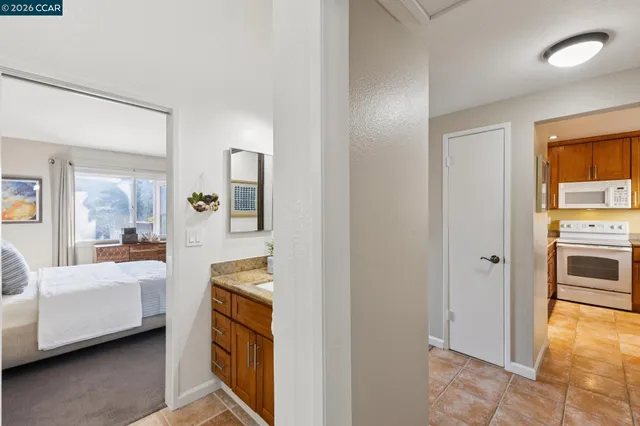 a bedroom with a bed and a view of bedroom