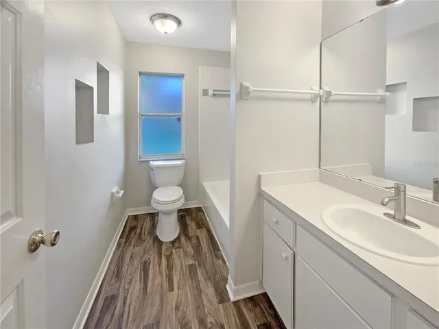 a bathroom with a sink and a toilet
