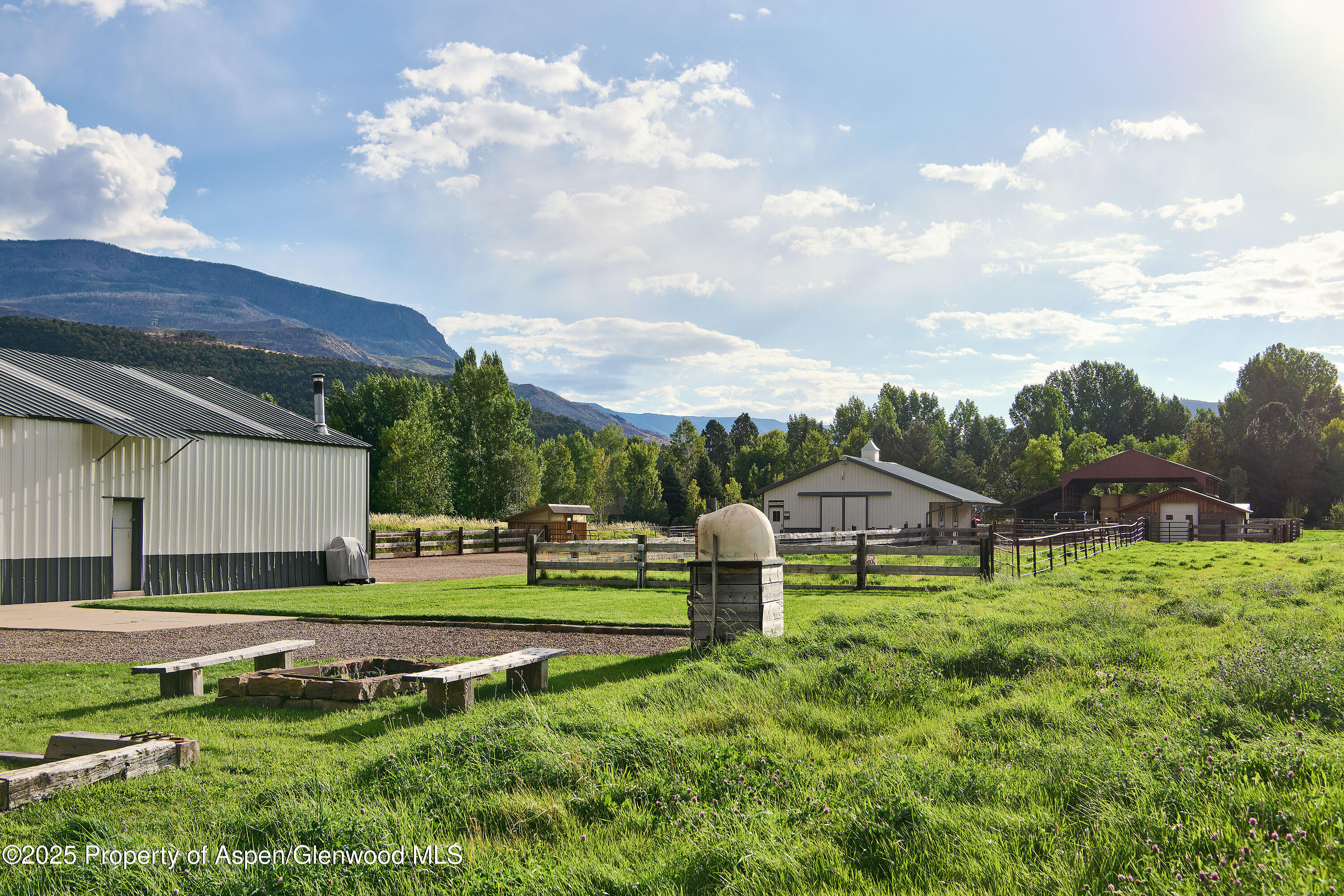 2700 Emma Road Basalt, CO 81621 - Photo 19 of 36 a view of house with backyard and outdoor seating