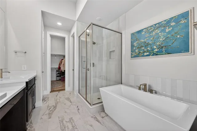 a bathroom with a sink double vanity and a mirror