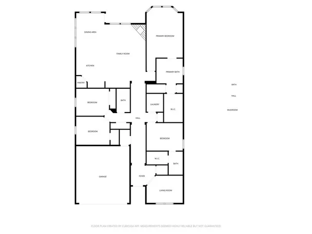 an aerial view of a houses with a yard