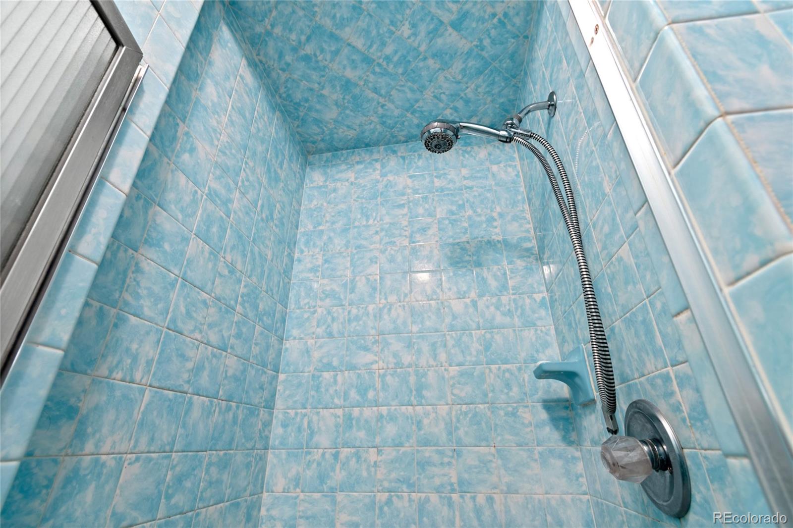 3315 Marshall Street Wheat Ridge, CO 80033 - Photo 18 of 30 a bathroom with a shower